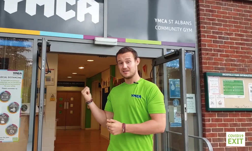 young man standing outside the gym